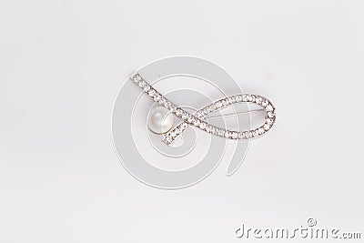 Beautiful Design of Jewelry Fashion Accessories for Women and lady Shiny Diamond brooch with pearl on the white background Stock Photo