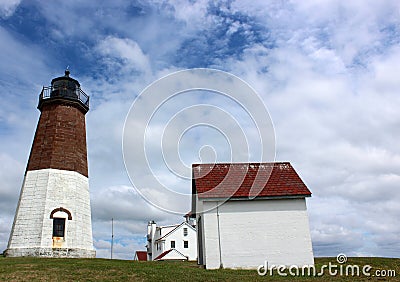 Welcoming scene of blue skies, puffy clouds and beloved lighthouse, Point Judith, Rhode Island, 2018 Editorial Stock Photo