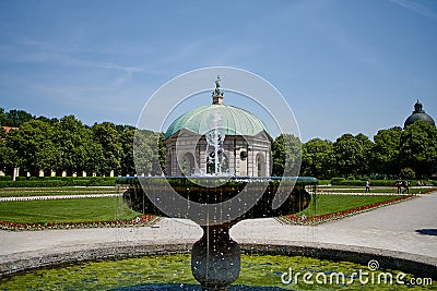 Beautiful Diana temple Dianatempel and a fountain in central Munich`s Hofgarten Stock Photo