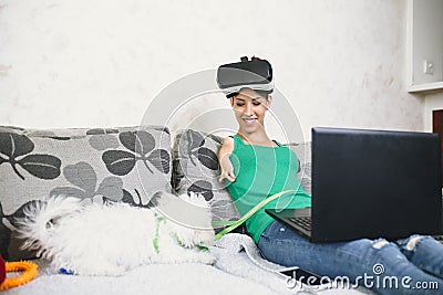 Disabled woman enjoying in virtual reality Stock Photo