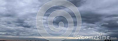 Beautiful dramatic and dark cloud formations right before an upcoming storm Stock Photo