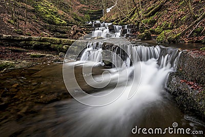 Beautiful dramatic landscape image of Scaleber Force waterfall in Yorkshire Dales in England during Winter morning Stock Photo