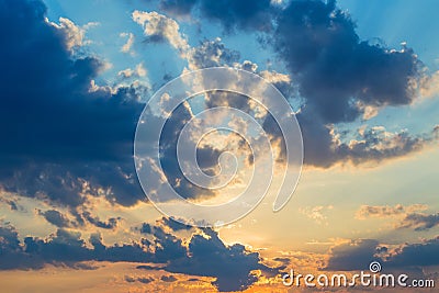 Beautiful dramatic scenic sunset or sunrise colored sky with clouds Stock Photo