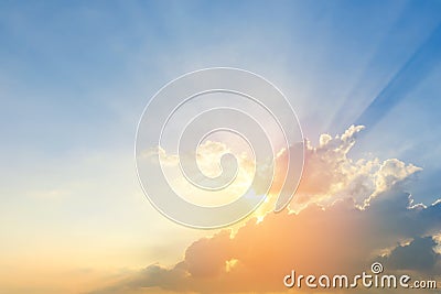 dramatic sky clouds with light rays at sunset. Natural landscape for background Stock Photo