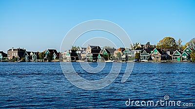 Beautiful Dutch Scene with Traditional Houses by the Canal in the Netherlands Stock Photo