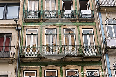Porto, Portugal - July, 2017. Beautiful traditional quaint houses in the old, vintage and touristic ribeira district of Porto, Por Editorial Stock Photo