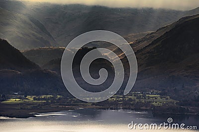 Beautiful early Winter morning landscape view from Latrigg Fell in Lake District across Derwentwater towards Castle Crag and Stock Photo