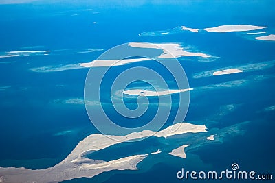 Beautiful earth and sea from a window airplane background Stock Photo