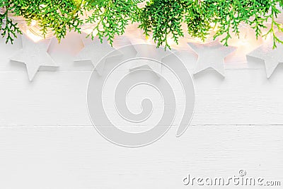 Beautiful elegant Christmas New Year background.white stars sparkling golden lights garland on wood. High resolution banner poster Stock Photo