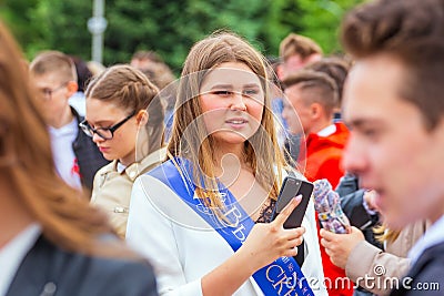 Beautiful elegant school graduate Editorial Stock Photo