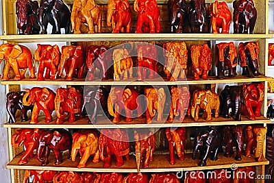 Beautiful elephants statue in track create by wooden image Stock Photo