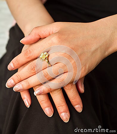Beautiful engagement ring on a daughter's finger Stock Photo