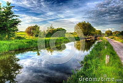 Beautiful English canal and lock gate on calm still day in colourful HDR Stock Photo
