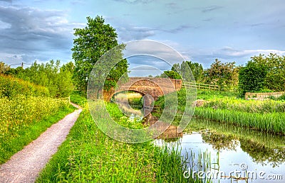 Beautiful English river and bridge on calm still day in colourful HDR Stock Photo