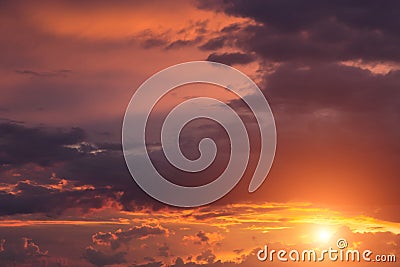 Beautiful epic sunset orange pink sky with clouds, sun, sunlight Stock Photo