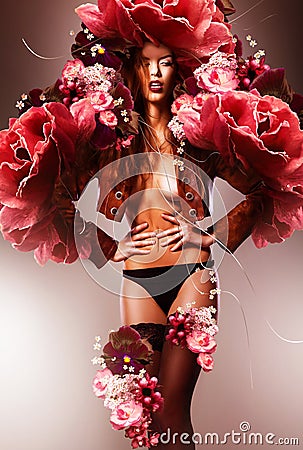 Beautiful erotic flower woman in flowers Stock Photo