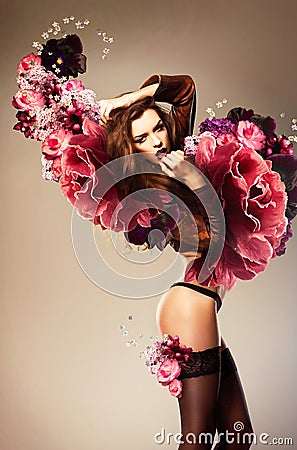 Beautiful erotic woman with flower Stock Photo