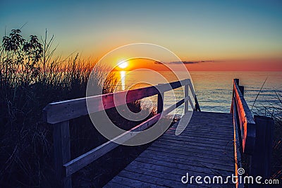 Beautiful evening sunset landscape at Canadian Ontario lake Huron in Pinery Park, orange blue red sky sun Stock Photo