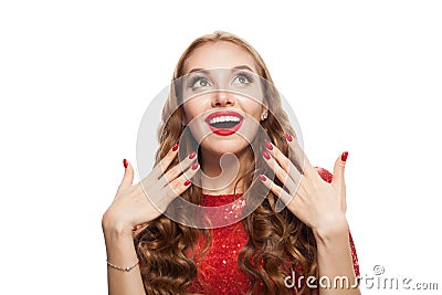 Beautiful excited woman with red manicured nails on white background Stock Photo