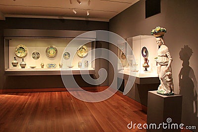 Beautiful exhibits on stands and in glass cases,Cleveland Art Museum,Ohio,2016 Editorial Stock Photo