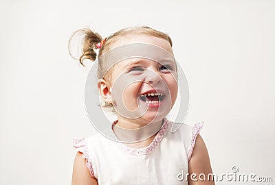 Beautiful expressive adorable happy cute laughing smiling baby infant face Stock Photo