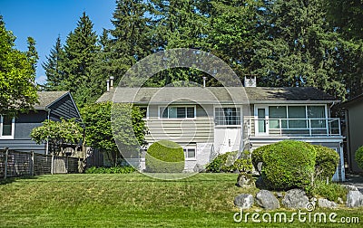 Beautiful exterior house in rural suburban neighborhood. Real Estate Exterior Front House on a sunny day. Big house Editorial Stock Photo