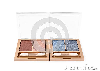 Beautiful eye shadow palettes with brushes isolated on white Stock Photo