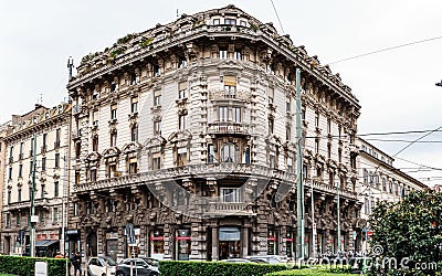 Beautiful facade of a corner building. Milan, Italy Editorial Stock Photo