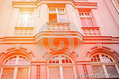 Beautiful facade of the old house. Fragment, detail. Orange toned. Jena, Germany Stock Photo