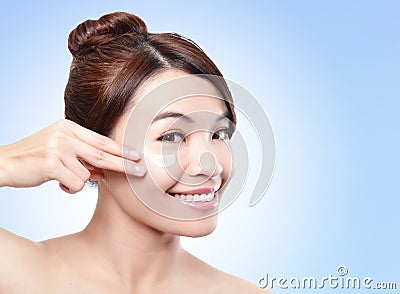 Beautiful face of girl applying moisturize cream Stock Photo