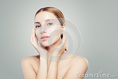 Beautiful face. Perfect woman with clear skin close up portrait. Facial treatment and cosmetology concept Stock Photo