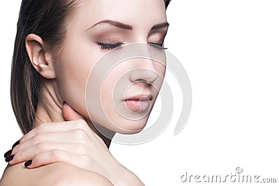 Beautiful face of young adult woman with clean fresh skin Stock Photo