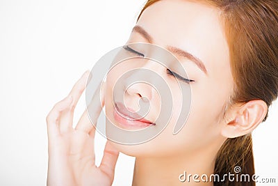 Beautiful face of young adult woman with clean fresh skin. Stock Photo