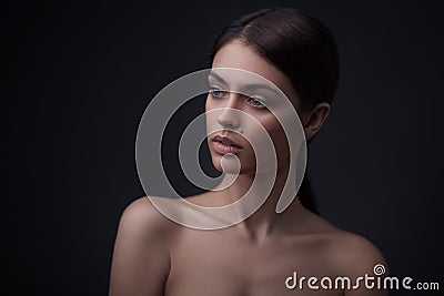 Beautiful face of young adult woman with clean fresh skin Stock Photo