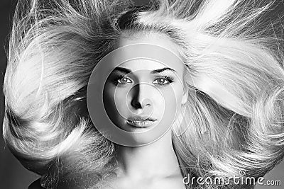 Beautiful Face of Young Woman. Blond girl. monochrome portrait. Beautiful healthy hair. Beauty salon Stock Photo