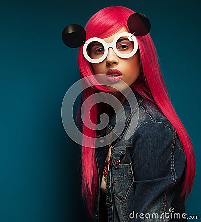 Beautiful fashion model with pink hair Stock Photo