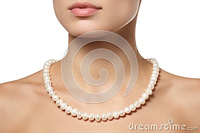 Beautiful fashion pearls necklace on the neck. Jewellery and bijouterie Stock Photo