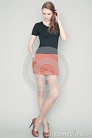 https://thumbs.dreamstime.com/x/beautiful-fashion-red-haired-model-trendy-dress-portrait-fashionable-black-light-brown-posing-over-gray-background-sexy-40547202.jpg