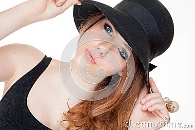 Beautiful fashion teen in makeup and hat Stock Photo