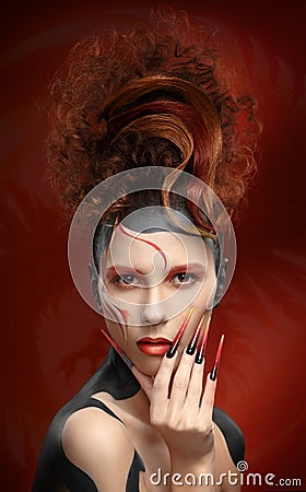 Beautiful fashion woman color face art fenix style and nail desi Stock Photo