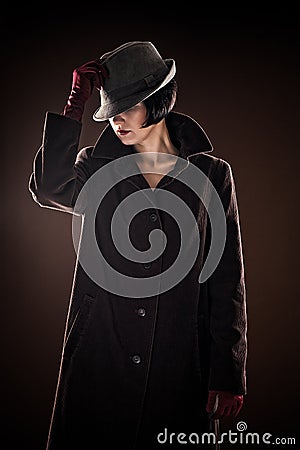 Beautiful fashionable woman detective Stock Photo