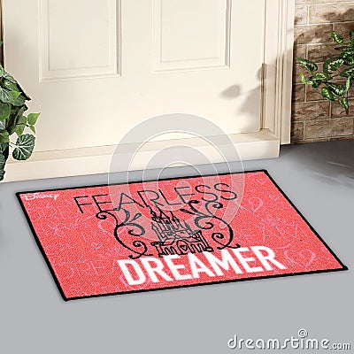 Beautiful Fearless Dreamer Printed Kids Woolen Welcome Entry Doormat outside home with yellow flowers and leaves Stock Photo