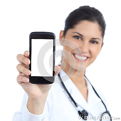 Beautiful female doctor smiling and showing a blank smart phone screen isolated Stock Photo