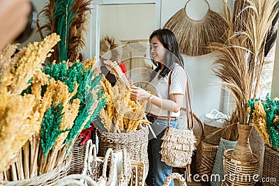 beautiful female holding a flower crafts Stock Photo