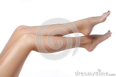 Beautiful female legs after depilation. Healthcare, foot care, rutine treatment. Spa and epilation Stock Photo