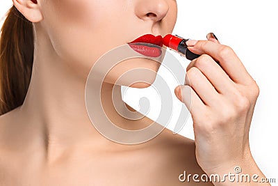 Beautiful female lips with make-up and brush Stock Photo