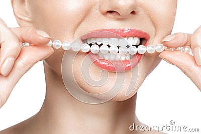 Beautiful female teeth smile and pearl necklace, Dental Health Concept Teeth whitening. Dental clinic patient. Image Stock Photo