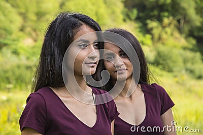 Beautiful female twins Stock Photo