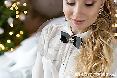 Beautiful festive accessories for the holidays, a girl with a butterfly on her shirt, holiday dresses Stock Photo