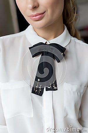 Beautiful festive accessories for the holidays, a girl with a butterfly on her shirt, holiday dresses Stock Photo